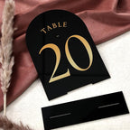 UNIQOOO Black Arch Wedding Table Numbers with Stands 1-30, Gold Foil Printed 5x7 Double Sided Acrylic Signs and Holders, Perfect for Centerpiece, Reception, Decoration, Party, Anniversary, Event