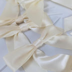 50pcs 3-1/2" Mini Satin Ribbon Bows with Twist Ties for Crafts Cream Color for Gift Wrapping Packing Holiday Candy Decoration (3.5"-Ivory)