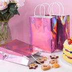 24 Pcs Iridescent Pink Gift Bags Decorations, Holographic Foil Party Favor Bags with Handles, Pink Paper Candy Goodie Bag with 24 Tissue Paper for Graduation Birthday Baby Shower Party Supplies