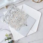 Hosmsua 5.1 x 7.3 Inch 50PCS Silver Glitter Wedding Invitation Cards with Rhinestone Laser Cut Hollow Flora Quinceanera Invitation with Envelopes for Bridal Shower Wedding Invite (Silver Glitter)