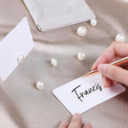 UNIQOOO 12Pcs Decorative Pearl Place Card Holders Bulk, Elegant Ivory Name Card Stands Set, for Wedding Table Place Cards, Dessert Table Decor, Retail Shop, Business Card, Name Tag, Party Food Signs