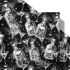 LeZakaa Halloween Wrapping Paper Roll, Gothic Skull-in-Bottle and Eye Cocktail Glass in Black, Spooky Gift Wrap for Horror Lovers, Goth Style Party, Trick or Treat, Mini Roll 17 In x 16.4 Feet